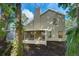 Two-story house with screened porch and wooded backyard at 812 Shell Ln, Longwood, FL 32750