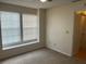 Bedroom with window seat and carpet flooring at 6088 Westgate Dr # 203, Orlando, FL 32835