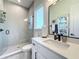 Modern bathroom with white vanity, quartz countertop, and glass shower at 2161 Lake Howell Preserve Ct, Maitland, FL 32751