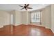 Bright living room with hardwood floors and a ceiling fan at 655 Pensacola Ln, Lake Mary, FL 32746