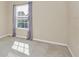 Bright bedroom with large window and neutral decor at 655 Pensacola Ln, Lake Mary, FL 32746