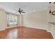 Spacious living room featuring hardwood floors and a ceiling fan at 655 Pensacola Ln, Lake Mary, FL 32746