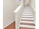 Interior view of a clean, modern staircase at 655 Pensacola Ln, Lake Mary, FL 32746