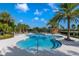 Stunning pool with lounge chairs and palm trees at 2026 Key Bay Trl, Kissimmee, FL 34747