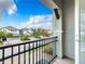 Private balcony offering views of the neighborhood and surrounding area at 7702 Graben St, Kissimmee, FL 34747