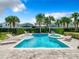 Stunning pool and spa surrounded by lush landscaping at 7702 Graben St, Kissimmee, FL 34747