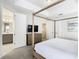 Main bedroom with ensuite bathroom and walk-in closet at 7702 Graben St, Kissimmee, FL 34747