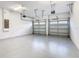 Two-car garage with automatic openers and ample storage space at 7702 Graben St, Kissimmee, FL 34747
