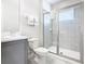 Clean bathroom with a single vanity, toilet, and a shower stall at 7702 Graben St, Kissimmee, FL 34747