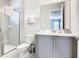 Clean bathroom with shower, toilet and vanity at 7702 Graben St, Kissimmee, FL 34747