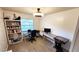 Bright home office features built-in shelving and workspace at 4013 Quenita Dr, Winter Park, FL 32792