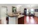 Kitchen with granite countertops and a breakfast bar at 4312 Heritage Trl, Leesburg, FL 34748