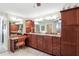 Double vanity bathroom with granite countertops and lots of cabinet space at 4312 Heritage Trl, Leesburg, FL 34748