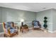 Condo lobby with seating area and decorative plants at 1150 Carmel Cir # 201, Casselberry, FL 32707