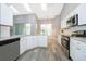 Modern kitchen with granite countertops and stainless steel appliances at 7304 High Lake Dr, Orlando, FL 32818