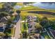 Aerial view of house near lake with neighborhood view at 7304 High Lake Dr, Orlando, FL 32818