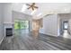 Open living room with vaulted ceilings and fireplace at 7304 High Lake Dr, Orlando, FL 32818