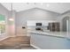 Modern kitchen with granite countertops and stainless steel appliances at 7304 High Lake Dr, Orlando, FL 32818