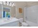 Clean bathroom with a shower/tub combo, vanity, and tile flooring at 514 Lucaya Loop # 514, Davenport, FL 33897