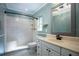 Bathroom with white vanity, tiled shower, and a neutral color scheme at 2148 Chippewa Trl, Maitland, FL 32751