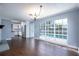 Bright dining room with hardwood floors, fireplace and view of the pool at 2148 Chippewa Trl, Maitland, FL 32751