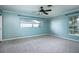 Spacious bedroom with light blue walls and carpeted floors at 2148 Chippewa Trl, Maitland, FL 32751