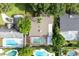Aerial view of residential neighborhood with pools at 2148 Chippewa Trl, Maitland, FL 32751