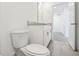 Clean bathroom with vanity, toilet and access to bedroom at 2462 Leeds St, Haines City, FL 33844