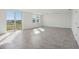 Bright living room with tile floor and sliding glass doors at 2462 Leeds St, Haines City, FL 33844