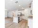 Open kitchen, stainless steel appliances, island at 2342 White Tail St, Davenport, FL 33837