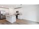 Bright kitchen with island and stainless steel appliances at 2342 White Tail St, Davenport, FL 33837