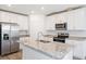 Modern kitchen with stainless steel appliances and island at 2342 White Tail St, Davenport, FL 33837