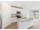 Modern kitchen with stainless steel appliances and an island at 2342 White Tail St, Davenport, FL 33837