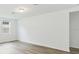Spacious living room with hardwood floors at 2342 White Tail St, Davenport, FL 33837