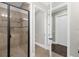 Bathroom with a walk-in shower and modern fixtures at 7481 Gathering Loop, Reunion, FL 34747