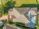 Bird's-eye view of a home with a private pool at 7481 Gathering Loop, Reunion, FL 34747