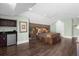 Guest bedroom with a king-size bed, built in drawers, and a small wet bar at 7481 Gathering Loop, Reunion, FL 34747