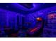 Game room with Avengers theme and various arcade games at 7481 Gathering Loop, Reunion, FL 34747