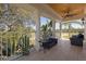 Private balcony overlooking the golf course with seating for relaxation at 7481 Gathering Loop, Reunion, FL 34747