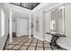 Spacious entry with high ceilings, tile floors, and white columns at 7481 Gathering Loop, Reunion, FL 34747