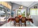 Dining room with table, chairs, and view of backyard at 2713 Chatham Cir, Kissimmee, FL 34746