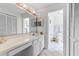 Bathroom with double sinks and a toilet at 2713 Chatham Cir, Kissimmee, FL 34746