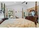 Spacious main bedroom with a large bed and TV at 2713 Chatham Cir, Kissimmee, FL 34746