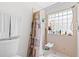 Bathroom with shower stall, toilet, and linen towels at 2713 Chatham Cir, Kissimmee, FL 34746