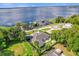 Lakefront property with backyard oasis and circular driveway at 238 E Lakeshore Dr, Clermont, FL 34711