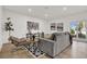 Cozy living area with lake views and a comfortable seating arrangement at 238 E Lakeshore Dr, Clermont, FL 34711