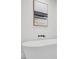 Relaxing bathroom with freestanding tub and modern wall art at 238 E Lakeshore Dr, Clermont, FL 34711