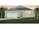 Charming one-story home with two-car garage and landscaped lawn at 3087 Norcott Dr, Davenport, FL 33837