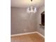 Bright dining room with chandelier and tile floors at 1347 Heather Lake Dr, Orlando, FL 32824