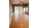 Spacious living room featuring tile floors and sliding glass doors at 1347 Heather Lake Dr, Orlando, FL 32824